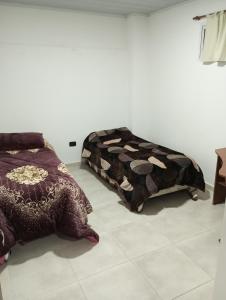 Postel nebo postele na pokoji v ubytování Concordia, Entre Rios