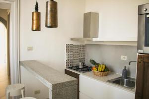 Kuchyň nebo kuchyňský kout v ubytování Villa Starace - Appartamento Buongiorno + 16 fotografií