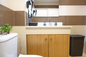 Kuchyň nebo kuchyňský kout v ubytování Marina Mar Vila Franca do Campo + 15 fotografií