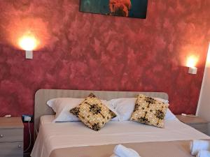 Posteľ alebo postele v izbe v ubytovaní b&b da zia maria