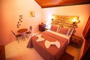 Postel nebo postele na pokoji v ubytování Chalé Lumiar Home & Pousada em Lagoa Santa - MG