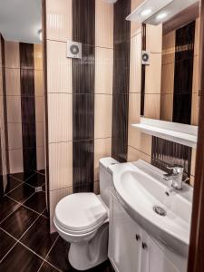 Koupelna v ubytování The Boulevard Luxury Apartment 2 + 8 fotografií
