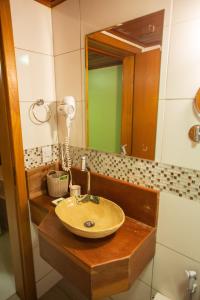 Koupelna v ubytování Chalé Lumiar Home & Pousada em Lagoa Santa - MG