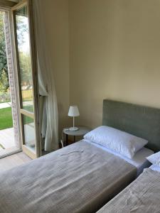 Letto o letti in una camera di La BouganVillea
