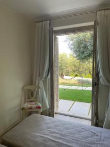 Letto o letti in una camera di La BouganVillea