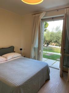 Letto o letti in una camera di La BouganVillea