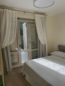 Letto o letti in una camera di La BouganVillea