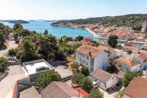 an aerial view of a town with the water at Apartment Tisno 4295a in Tisno