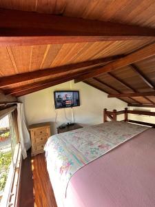 Postel nebo postele na pokoji v ubytování Loft Marrapaiá