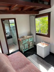 Postel nebo postele na pokoji v ubytování Loft Marrapaiá