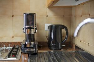 a coffee maker sitting on a counter in a kitchen at Villa Incoronata in Agerola