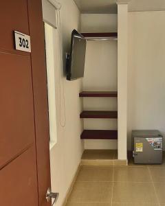 TV a/nebo společenská místnost v ubytování Hotel ZT