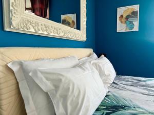 Postel nebo postele na pokoji v ubytování Verona Rooms