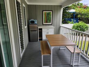 A balcony or terrace at Sunset Shores - UNIT B Kaiupoho
