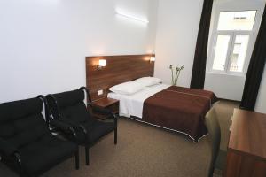 Postel nebo postele na pokoji v ubytování Riva Rooms