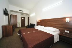 Postel nebo postele na pokoji v ubytování Riva Rooms