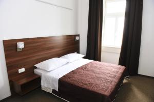 Postel nebo postele na pokoji v ubytování Riva Rooms