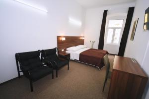 Postel nebo postele na pokoji v ubytování Riva Rooms