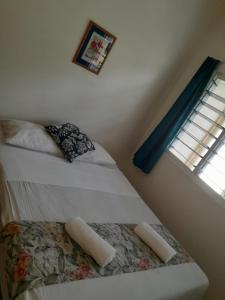 Postel nebo postele na pokoji v ubytování New Mavida Lodge