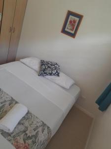 Postel nebo postele na pokoji v ubytování New Mavida Lodge