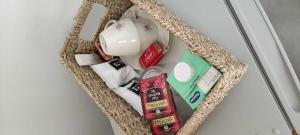 a wicker basket filled with different types of items at Guest House Ogliastra in Tortolì