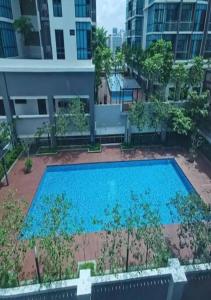 Bazén v ubytování Cozy Duplex-PJ Central Sec 13 nebo v jeho okolí