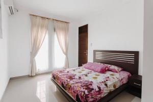 Кровать или кровати в номере Ubud Sea Villa 2