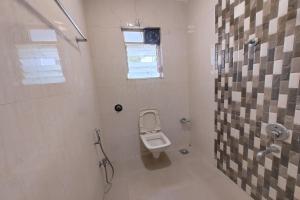 Koupelna v ubytování Hotel Sai Inn Executive