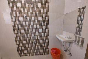 Koupelna v ubytování Hotel Sai Inn Executive