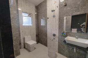 Koupelna v ubytování Hotel Sai Inn Executive