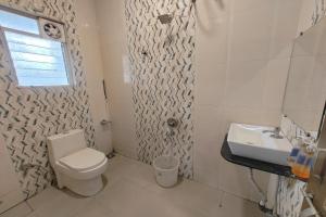 Koupelna v ubytování Hotel Sai Inn Executive