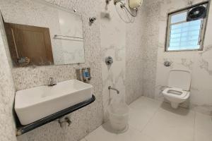 Koupelna v ubytování Hotel Sai Inn Executive