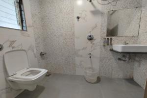 Koupelna v ubytování Hotel Sai Inn Executive