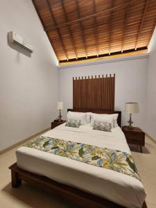 Ένα ή περισσότερα κρεβάτια σε δωμάτιο στο de' Asasta Villa Cemagi C2