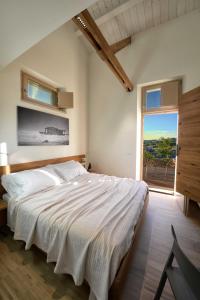 Кровать или кровати в номере Resort Il Gallo Senone