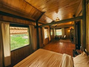 Postel nebo postele na pokoji v ubytování Sapa Tranquilla