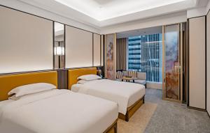 YTL ChangChengYunYue Hotel客房内的一张或多张床位