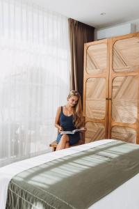 Postel nebo postele na pokoji v ubytování Mantra Wellness Center