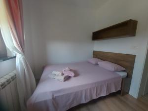 Voodi või voodid majutusasutuse Bitini Farm Apartment toas