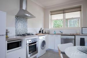 Kuchyň nebo kuchyňský kout v ubytování Luxury On Webster