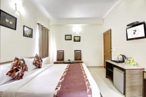 Postel nebo postele na pokoji v ubytování Persona International Hotel Karol Bagh Delhi