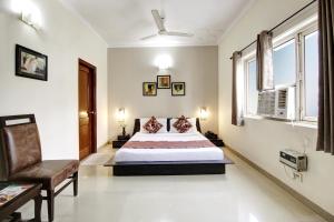 Postel nebo postele na pokoji v ubytování Persona International Hotel Karol Bagh Delhi