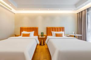 Lova arba lovos apgyvendinimo įstaigoje Raffles Executive Apartment - Guangzhou Huijin International Finance Center, Keyun Road Metro Station Branch-Canton Fair Free Shuttle