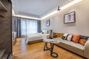 Lova arba lovos apgyvendinimo įstaigoje Raffles Executive Apartment - Guangzhou Huijin International Finance Center, Keyun Road Metro Station Branch-Canton Fair Free Shuttle