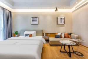 Lova arba lovos apgyvendinimo įstaigoje Raffles Executive Apartment - Guangzhou Huijin International Finance Center, Keyun Road Metro Station Branch-Canton Fair Free Shuttle