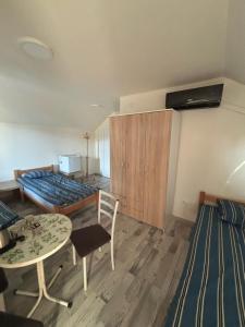 Postel nebo postele na pokoji v ubytování Apartmani Andjeo