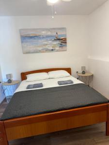 Ένα ή περισσότερα κρεβάτια σε δωμάτιο στο Fig Tree Murter