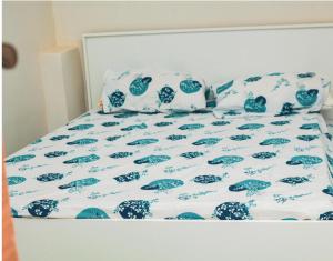 Llit o llits en una habitació de Petit Nid Cosy à Kinshasa