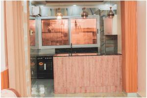 Cuina o zona de cuina de Petit Nid Cosy à Kinshasa