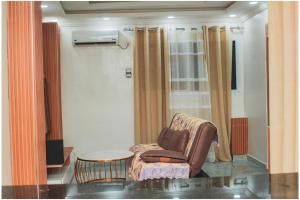 Zona d'estar a Petit Nid Cosy à Kinshasa